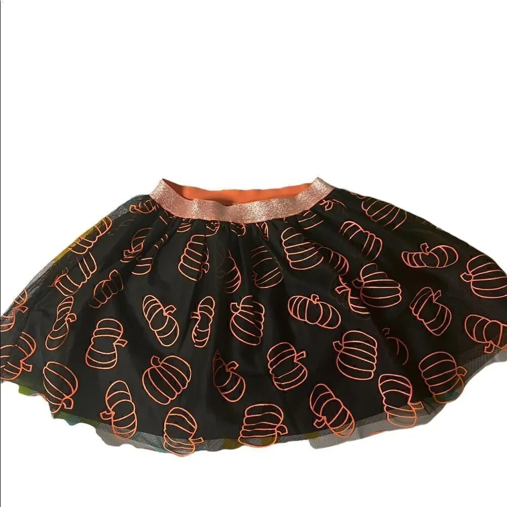 Black tutu orange pumpkins adorn this adorable fall Cat & Jack skirt